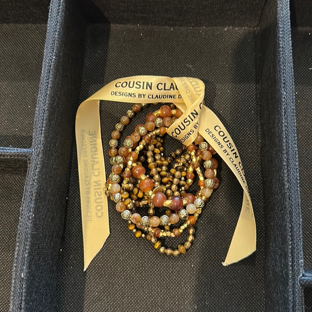 Cousin Claudine brown and gold beaded bracelet set.  9 piece set.